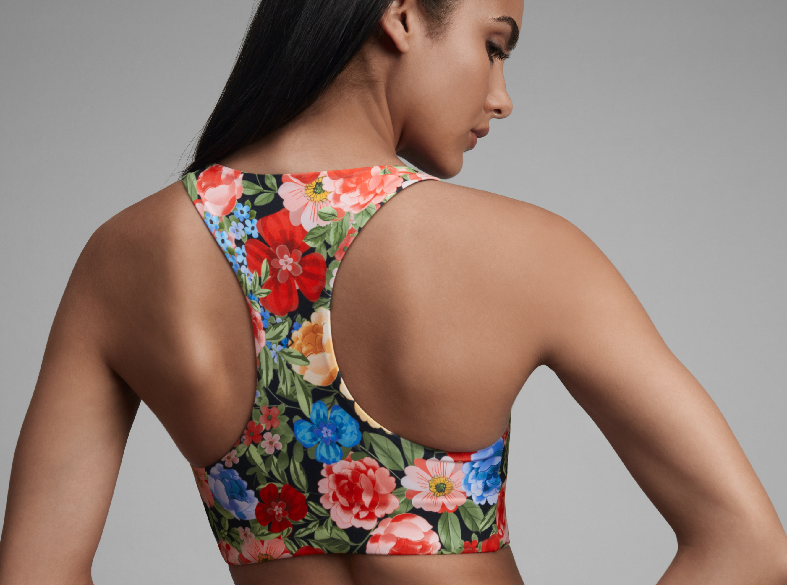 Woman in a floral sports bra