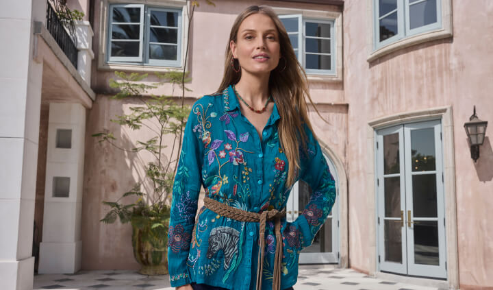 Model wearing embroidered blouse