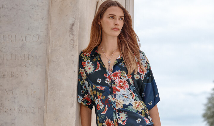 Model wearing printed blouse