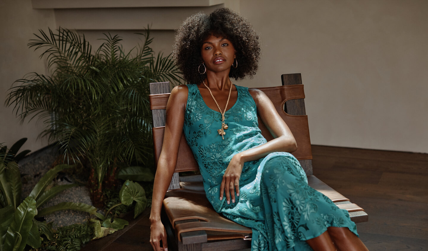 Model wearing green burnout maxi dress
