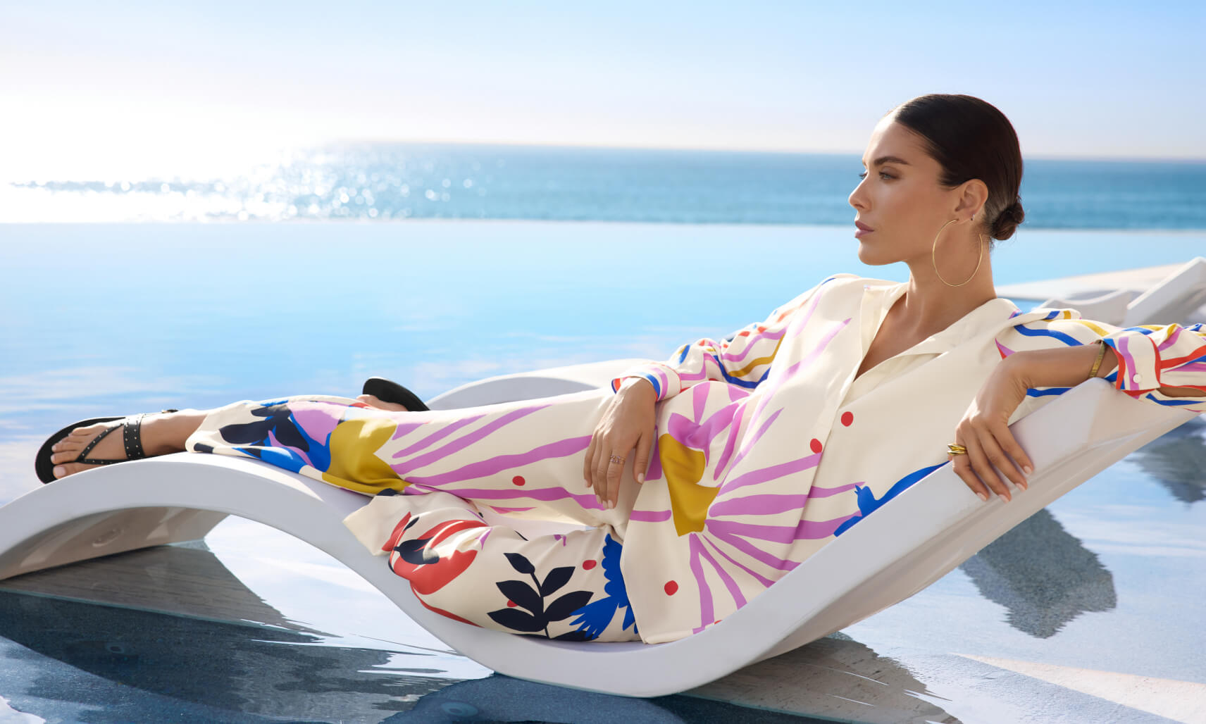Woman sitting wearing silk printed set
