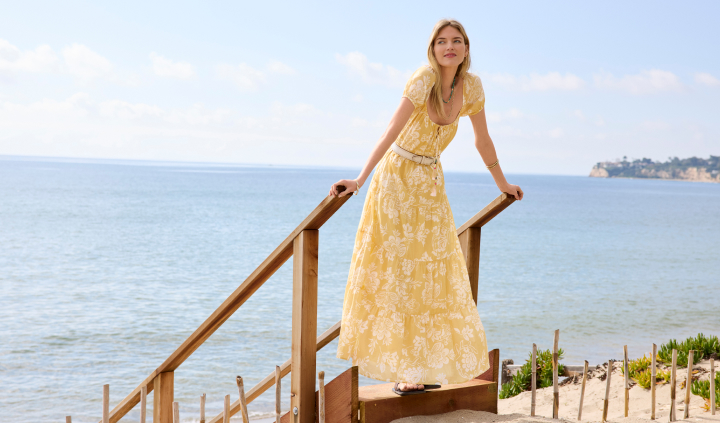 Model wearing a yellow dress
